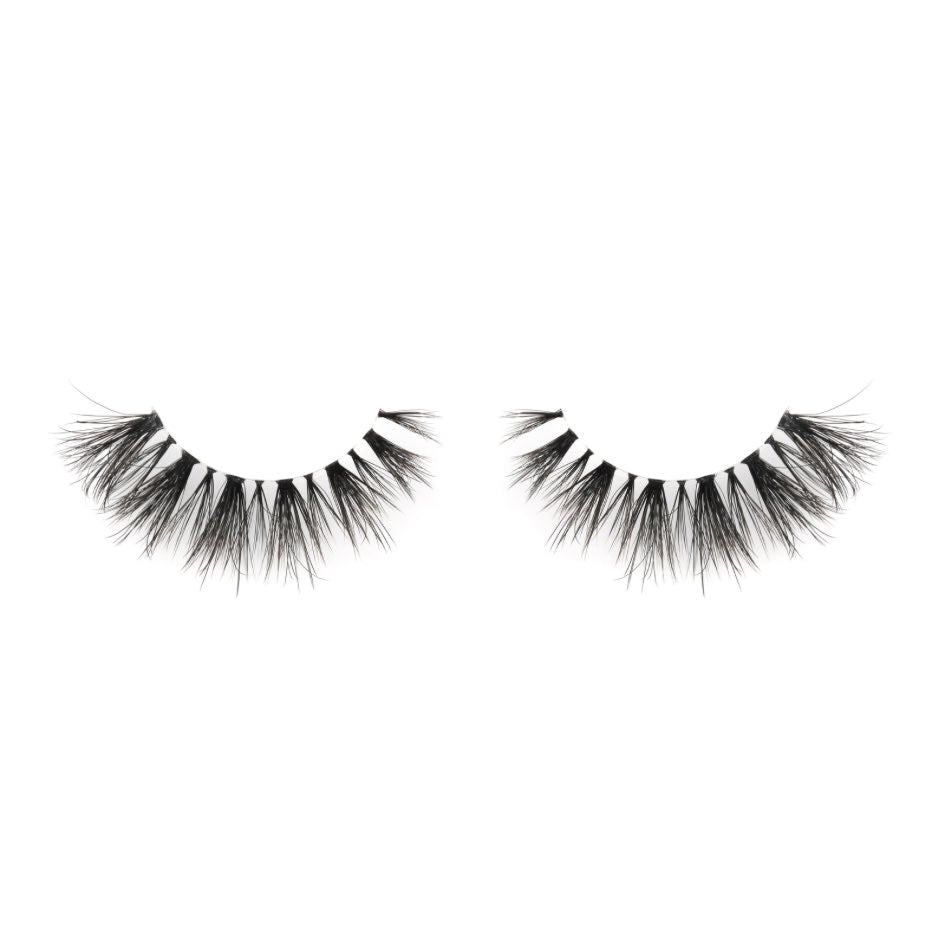 close up of a pair of fuffy mega wispy lightweight lashes on a white background